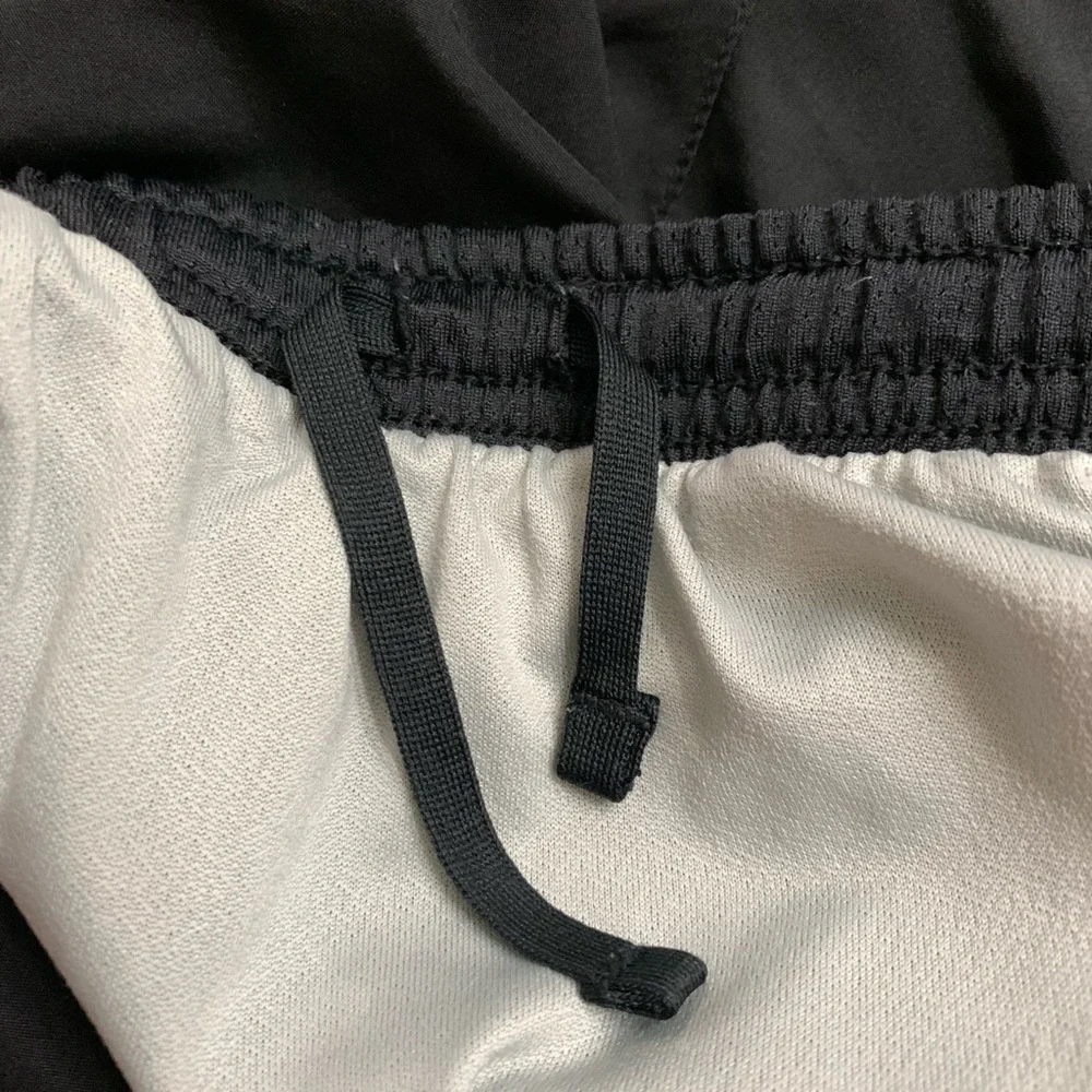 Nike black with white trim athletic shorts Size M